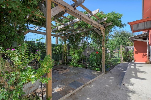 view of patio featuring a pergola