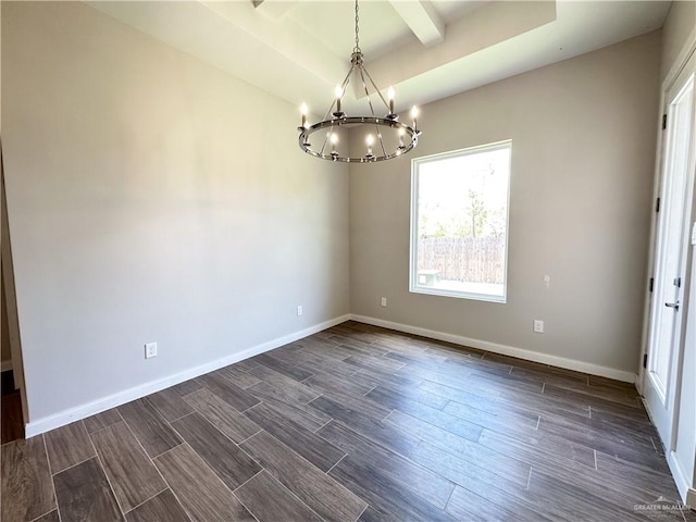 unfurnished room with beamed ceiling, dark wood-type flooring, and a chandelier