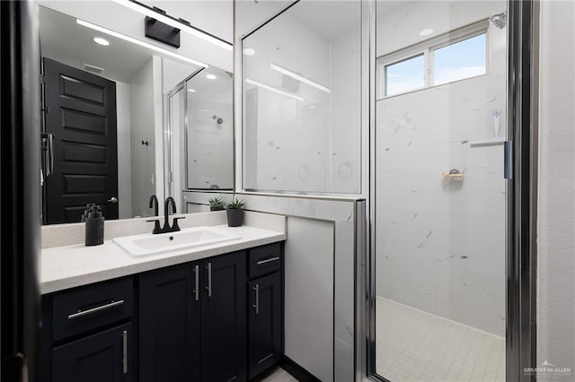 1820 Hill Dr, Mission, TX 78572 - bathroom featuring a stall shower, vanity, and recessed lighting