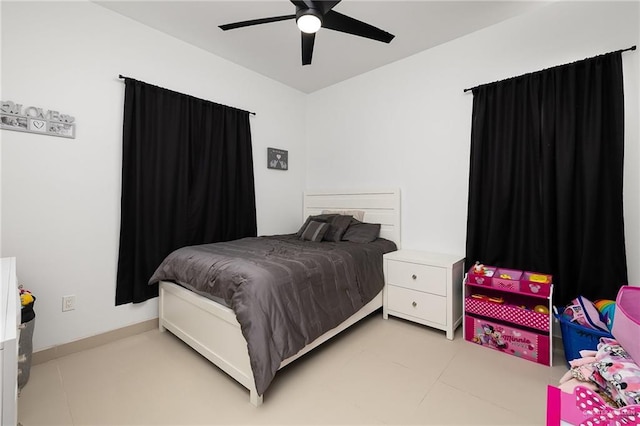 1820 Hill Dr, Mission, TX 78572 - bedroom featuring light tile patterned floors and ceiling fan