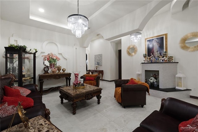 interior space featuring a notable chandelier and a tray ceiling