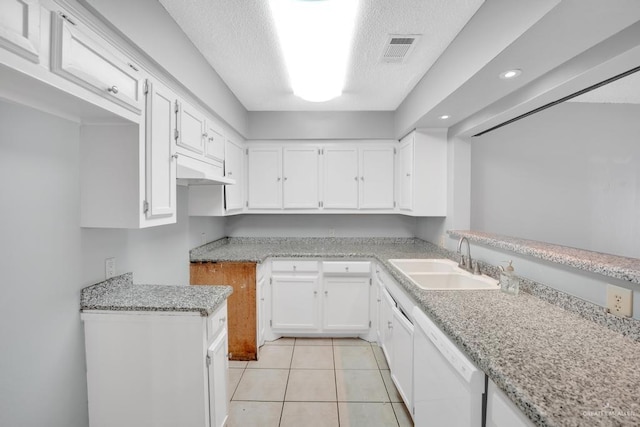 704 Kerry Ln, Mcallen, TX 78504 - kitchen featuring a sink, dishwasher, white cabinets, light tile patterned flooring, and recessed lighting
