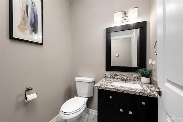 201 White Oak Dr, Los Fresnos, TX 78566 - half bathroom featuring toilet and vanity