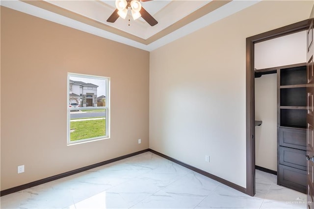 unfurnished bedroom featuring a closet and ceiling fan