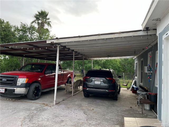 view of parking / parking lot with a carport