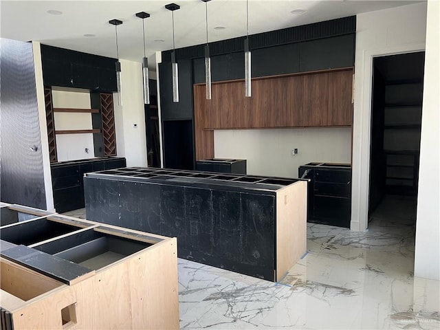 kitchen featuring a kitchen island and hanging light fixtures