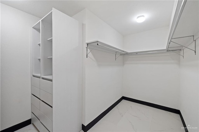 2018 Sabinal St, Mission, TX 78572 - walk in closet featuring marble finish flooring