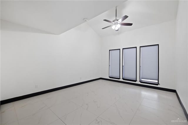 2018 Sabinal St, Mission, TX 78572 - empty room with lofted ceiling, ceiling fan, baseboards, and light marble finish floors