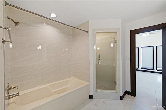 2018 Sabinal St, Mission, TX 78572 - bathroom featuring marble look tiles and baseboards