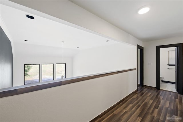 2018 Sabinal St, Mission, TX 78572 - corridor with dark wood finished floors, baseboards, and recessed lighting