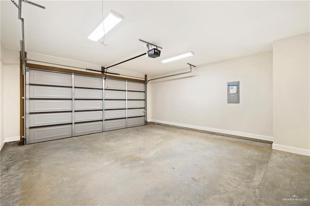 garage with electric panel, baseboards, and a garage door opener