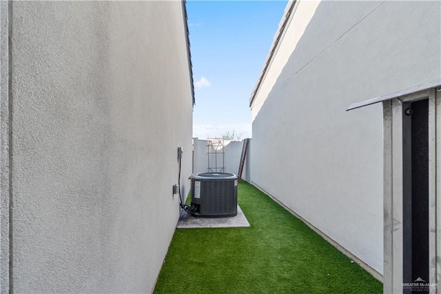 view of yard featuring central AC unit