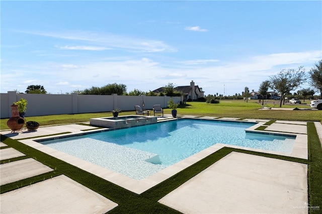 view of pool with a lawn, a patio area, and an in ground hot tub