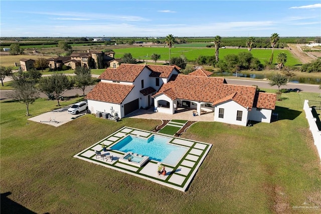 bird's eye view featuring a rural view and a water view