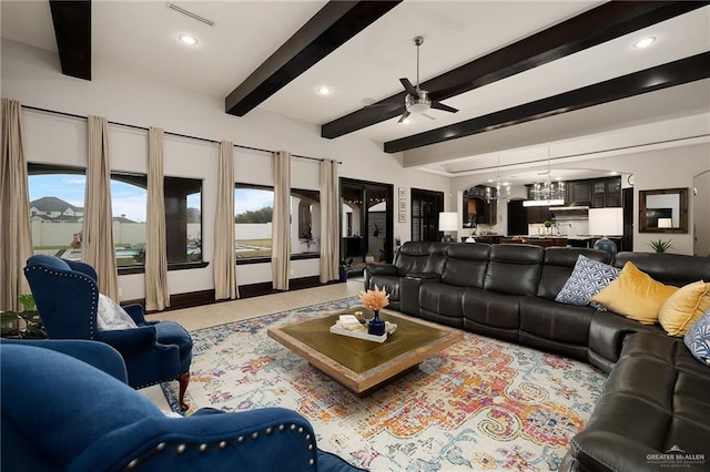 living room with beam ceiling and ceiling fan with notable chandelier