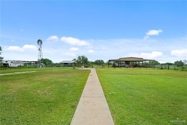 surrounding community featuring a lawn