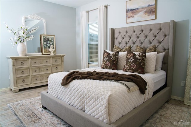 bedroom featuring light hardwood / wood-style floors