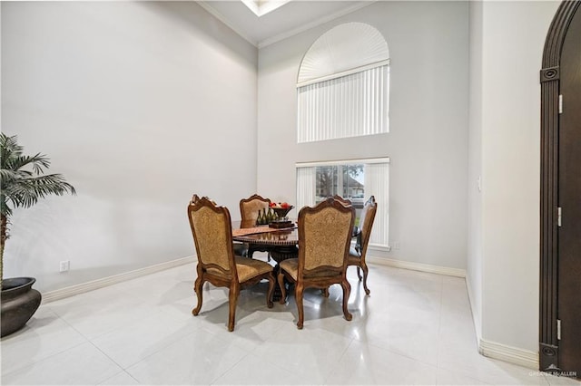 2005 E 28th St, Mission, TX 78574 - tiled dining area featuring ornamental molding and a high ceiling