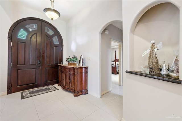 2005 E 28th St, Mission, TX 78574 - foyer featuring arched walkways and light tile patterned flooring