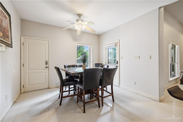 2005 E 28th St, Mission, TX 78574 - dining room with a ceiling fan and baseboards