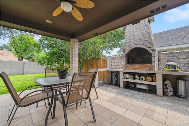 2005 E 28th St, Mission, TX 78574 - view of patio / terrace with outdoor dining space and a ceiling fan