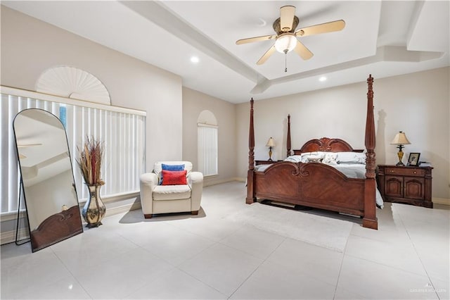 2005 E 28th St, Mission, TX 78574 - tiled bedroom with a raised ceiling, recessed lighting, ceiling fan, and arched walkways