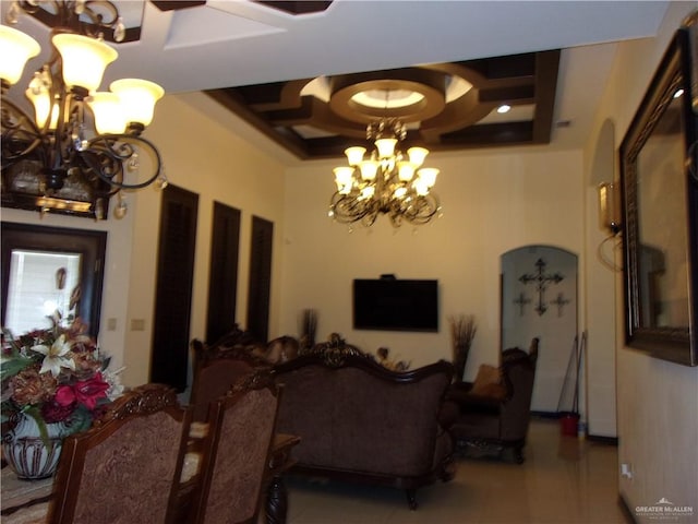 dining room with an inviting chandelier and coffered ceiling