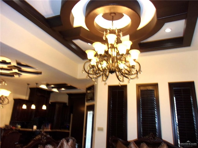 interior details featuring a notable chandelier