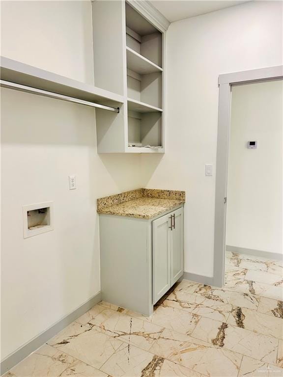 laundry room featuring cabinets and hookup for a washing machine