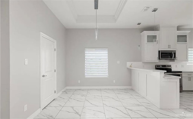 kitchen featuring glass insert cabinets, marble finish floor, light countertops, stainless steel appliances, and baseboards