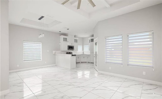 kitchen with glass insert cabinets, baseboards, open floor plan, appliances with stainless steel finishes, and marble finish floor