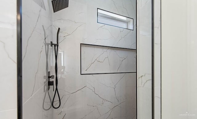 details featuring a tile shower