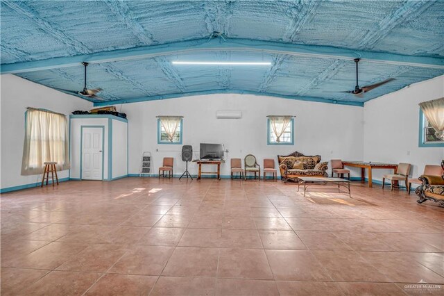 2865 E Mile 9 1/2 N, Donna, TX 78537 - garage with ceiling fan, baseboards, and a wall mounted air conditioner