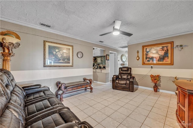 2865 E Mile 9 1/2 N, Donna, TX 78537 - living area with light tile patterned floors, crown molding, a ceiling fan, a textured ceiling, and baseboards