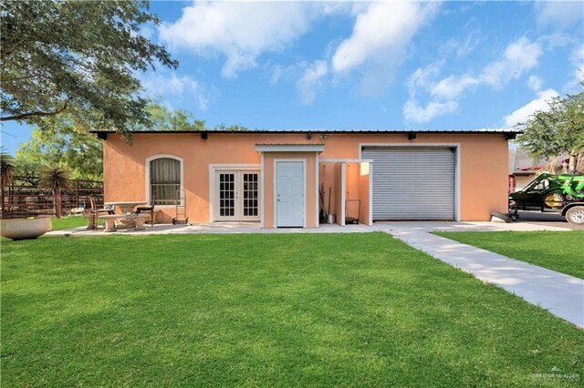 2865 E Mile 9 1/2 N, Donna, TX 78537 - mediterranean / spanish-style home featuring french doors, stucco siding, and a patio area