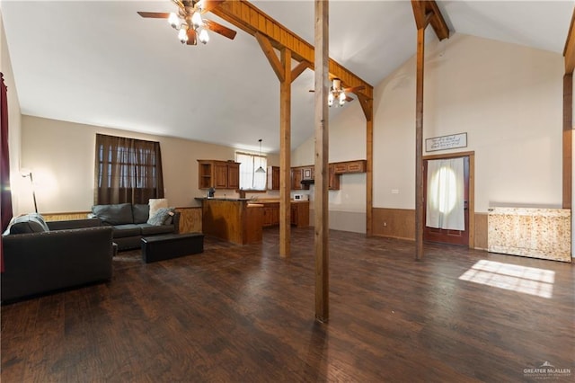 living room with dark hardwood / wood-style floors, ceiling fan, beam ceiling, and high vaulted ceiling