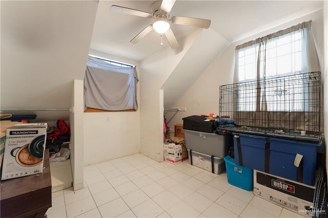 additional living space featuring ceiling fan and light tile patterned flooring