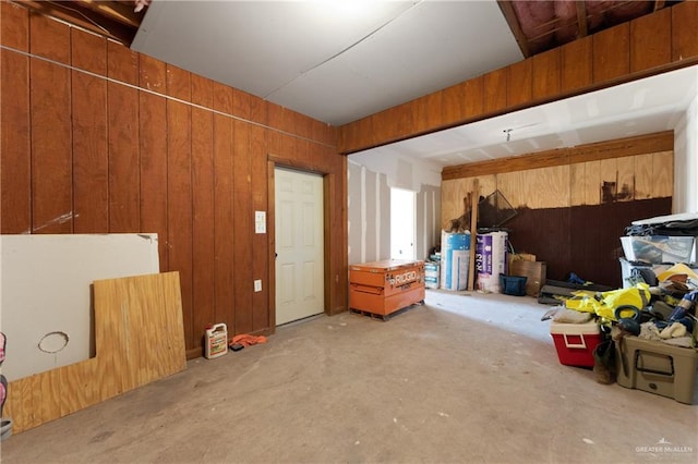 interior space featuring wood walls