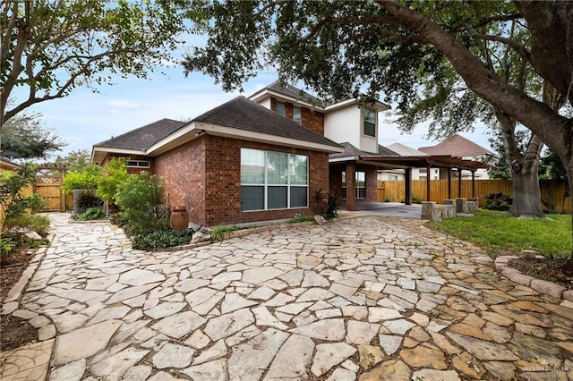 back of house featuring a patio