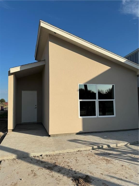 rear view of property with a patio