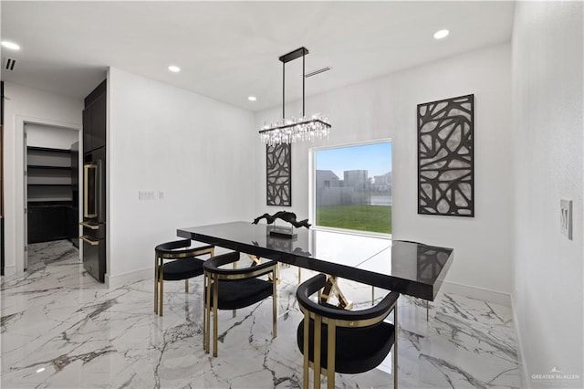 4648 Estancia Pkwy, Mcallen, TX 78504 - dining room featuring recessed lighting, marble tiled flooring, and a chandelier