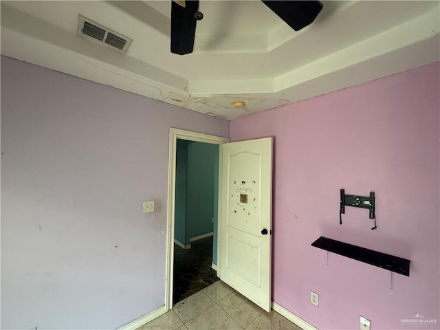 1908 W 42nd St, Mission, TX 78573 - unfurnished bedroom featuring light tile patterned floors, a ceiling fan, and baseboards