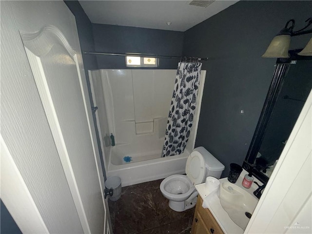 1908 W 42nd St, Mission, TX 78573 - full bathroom featuring marble look tile flooring, vanity, toilet, and shower / tub combo with curtain