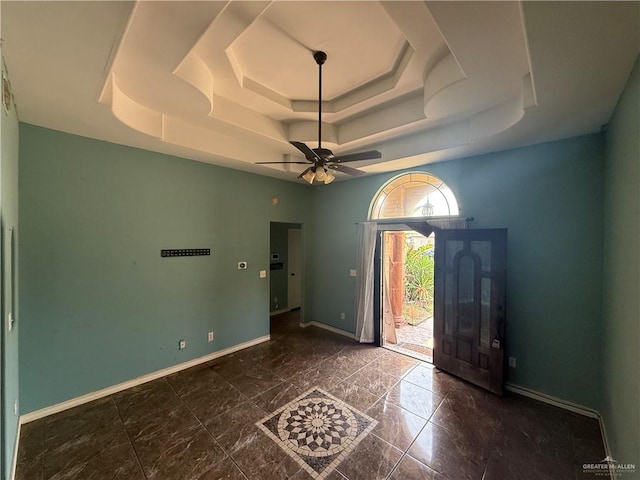1908 W 42nd St, Mission, TX 78573 - foyer featuring a raised ceiling, ceiling fan, and baseboards