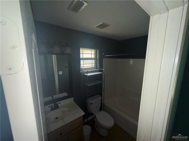 1908 W 42nd St, Mission, TX 78573 - full bathroom with toilet, vanity, and tub / shower combination