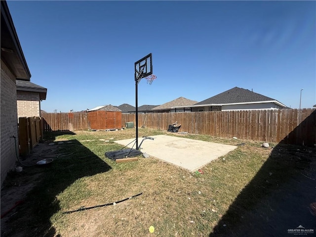 view of yard with a patio and a fenced backyard