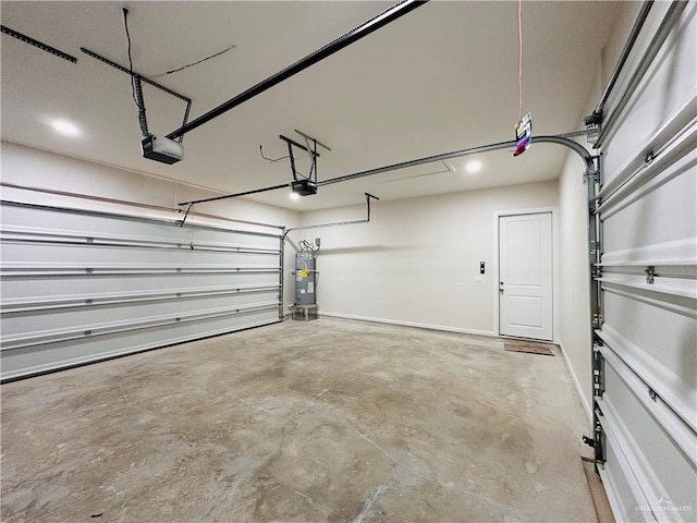 garage with secured water heater, baseboards, and a garage door opener