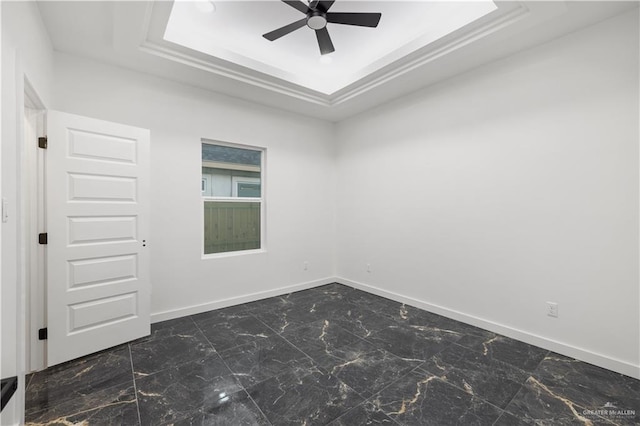 3009 E Bella Vista Ave, Alton, TX 78573 - unfurnished room with a ceiling fan, a tray ceiling, and baseboards