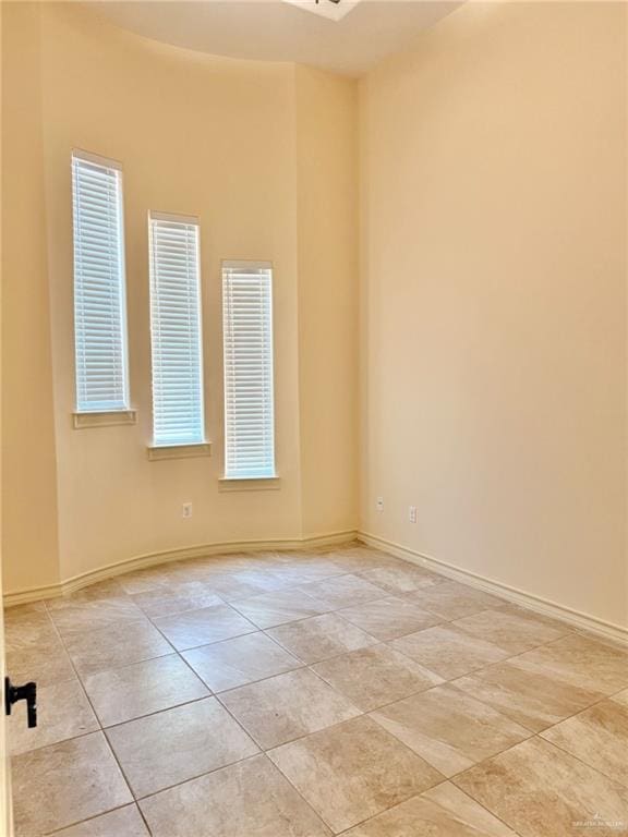 1813 Harvard Ave, Mcallen, TX 78504 - unfurnished room featuring baseboards and light tile patterned floors