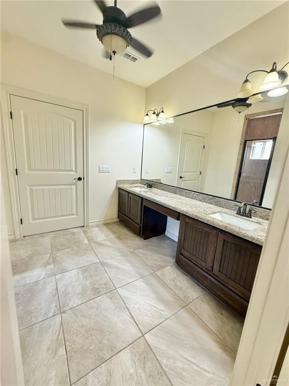 1813 Harvard Ave, Mcallen, TX 78504 - full bath with a ceiling fan and double vanity